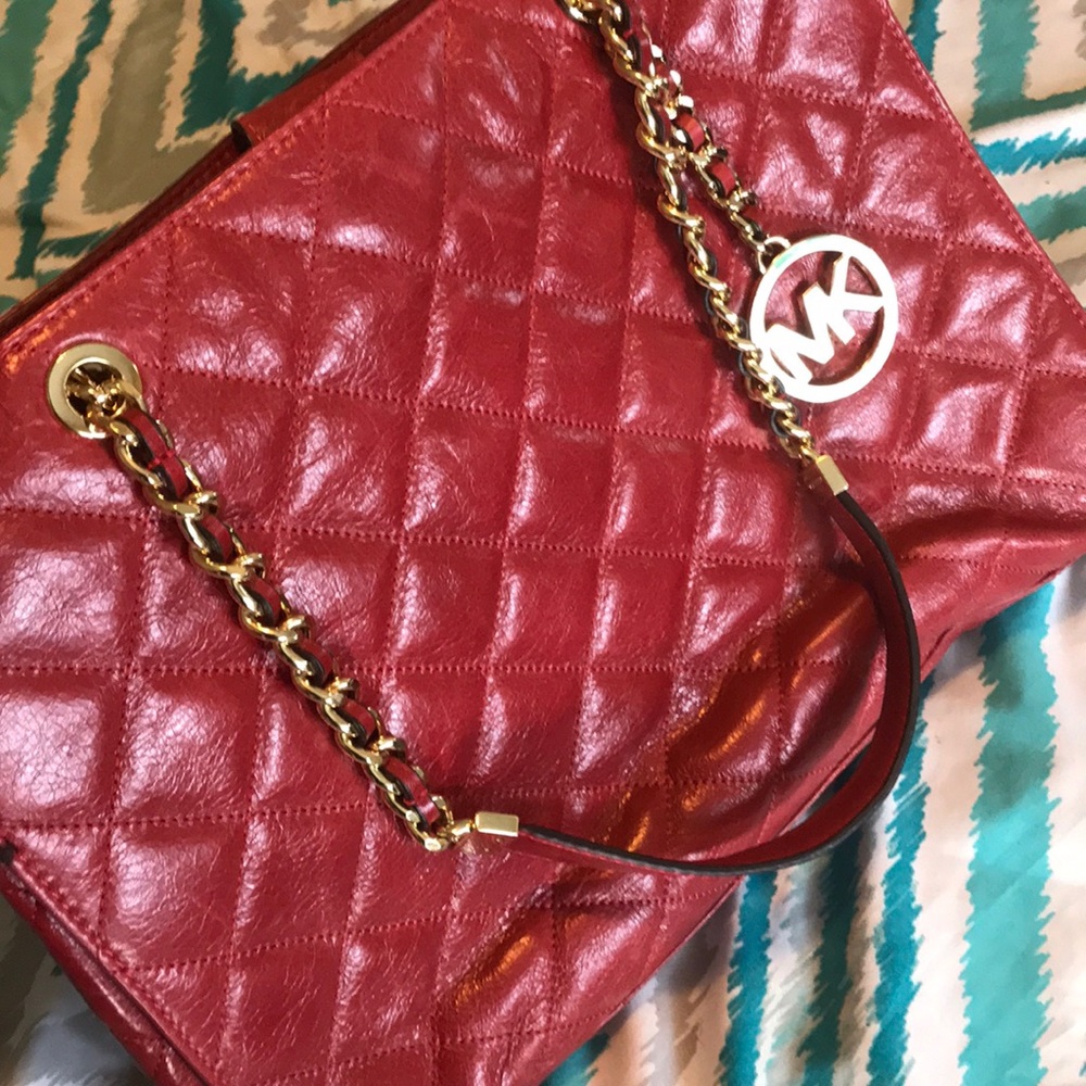 Deep red Michael Kors handbag